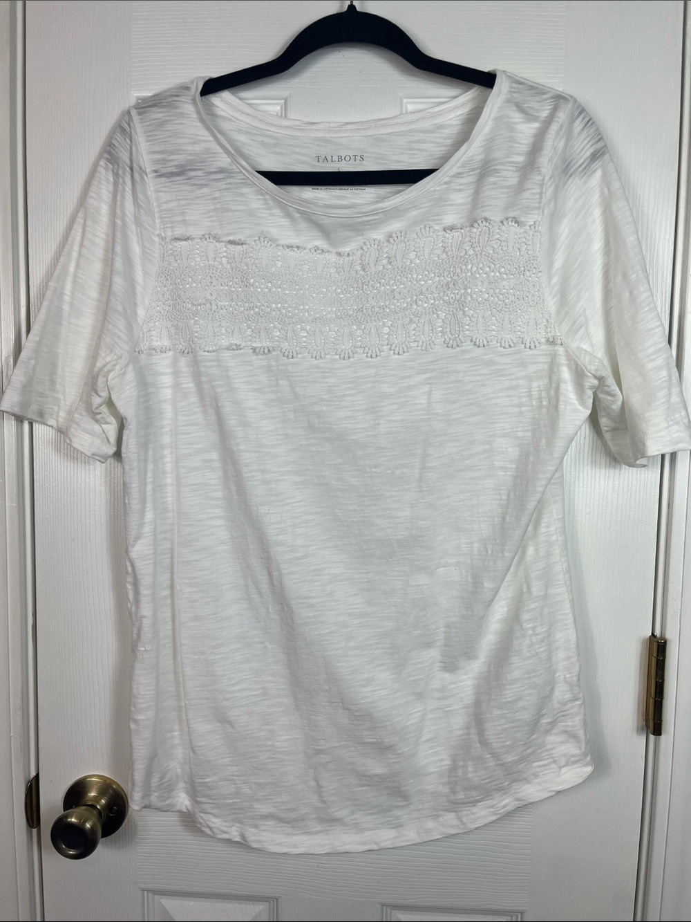 Talbots white short sleeved tee shirt size Lg. Lace across chest. 60% cotton